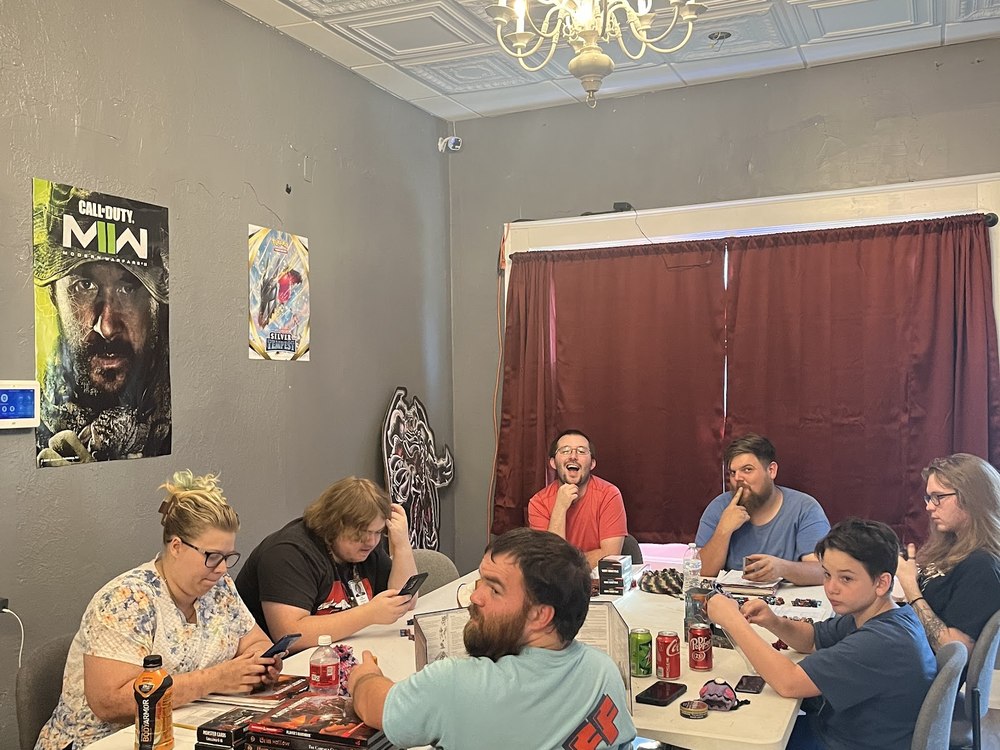 A group around the table on game night